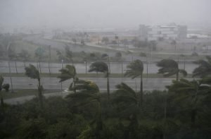 Heavy winds and rain from Hurricane Irma are seen in Miami, Florida, on September 10, 2017. Hurricane Irma regained strength to a Category 4 storm early Sunday as it began pummeling Florida and threatening landfall within hours. / AFP PHOTO / SAUL LOEB