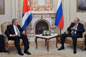 Russian President Vladimir Putin, right, and Cuban President Raul Castro meet in the Novo-Ogaryovo residence outside Moscow, Wednesday, July 11, 2012. (AP Photo/RIA-Novosti, Alexei Nikolsky, Presidential Press Service)